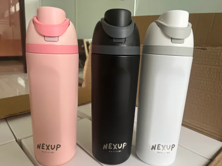 NEXUP branded bottles in pink, black, and white - where are Owala water bottles made