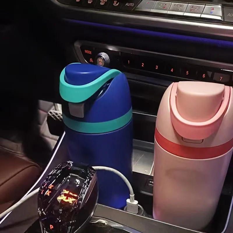 See how two large bottles fit side-by-side Does 32 oz Owala Fit in Cup Holder