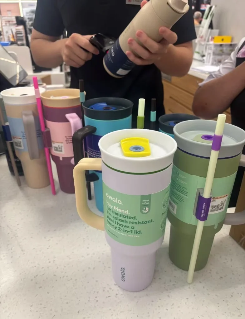 Various Owala bottles on table – are owalas dishwasher safe test