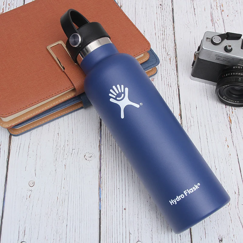 navy blue branded water bottles for high-end corporate branding