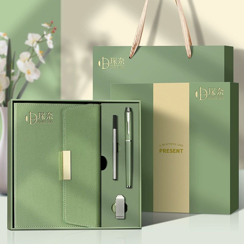 Green luxury corporate gifts box with notebook and metal pen