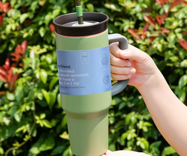 green leak-proof water bottle with straw for gym or travel